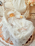VINTAGE BABY DOLL IN CRADLE MUSICAL