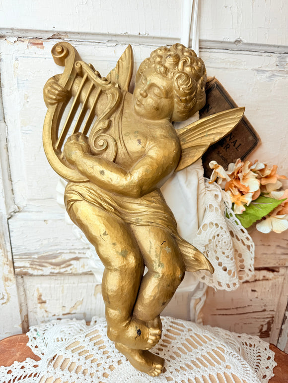 Large cherub with harp wall decor ￼