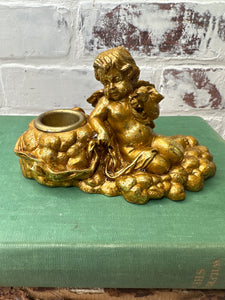 GOLDEN CHERUB CANDLESTICK HOLDER