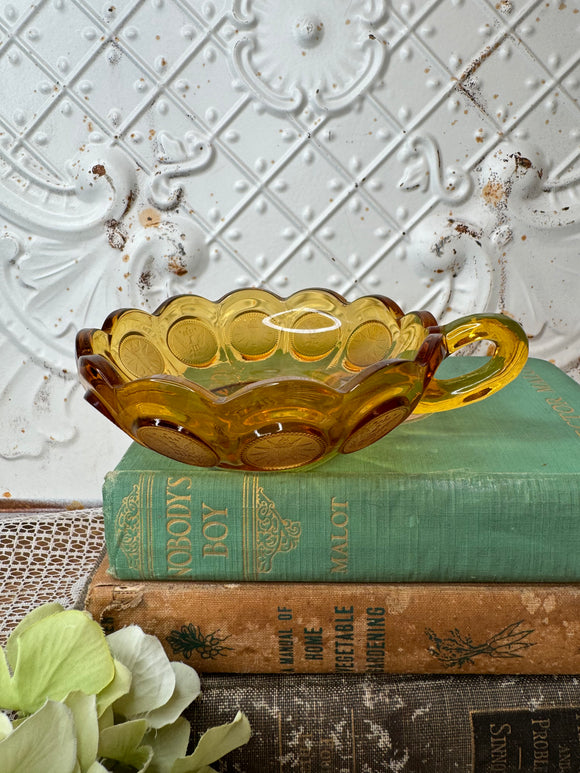 VINTAGE YELLOW GLASS DISH WITH HANDLE SUN AND STARS