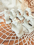 VINTAGE SET OF 8 FLORAL NAPKIN RINGS