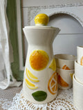 SET OF VINTAGE FRUIT MOTIF CUPS AND PITCHER SET