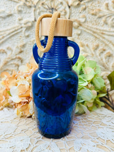 BLUE GLASS RIBBED VINTAGE ORNATE BOTTLE