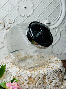TILTED VINTAGE GLASS JAR