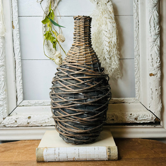 VINTAGE WICKER BOTTLE SHAPED VASE