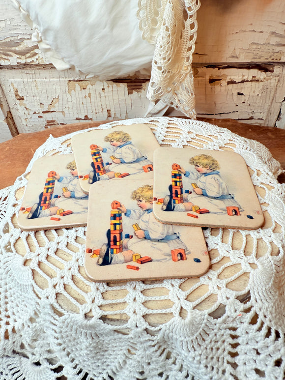 VINTAGE BABY WITH BLOCKS COASTER SET