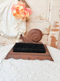 ANTIQUE CAST IRON SNAIL SHOE BRUSH