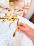 VINTAGE GOLD SET OF BOW NAPKIN HOLDERS