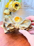 VINTAGE BRASS TONE BOW CANDLE HOLDER