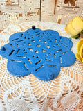 VINTAGE BLUE ORNATE CAST IRON TRIVET