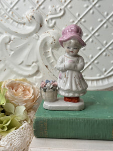 PORCELAIN VINTAGE GIRL STATUETTE