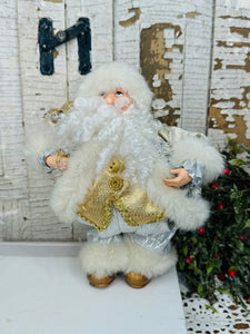 SILVER AND GOLD VINTAGE SANTA STATUETTE