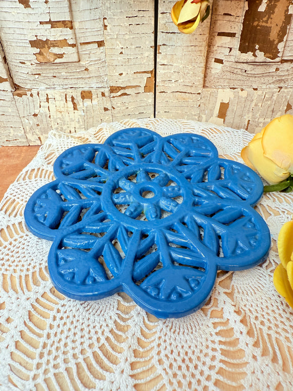 VINTAGE BLUE ORNATE CAST IRON TRIVET