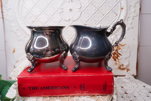 PAIR OF VINTAGE SILVER ORNATE SUGAR BOWL AND CREAMER