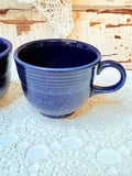 VINTAGE PAIR OF NAVY BLUE MUGS