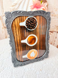 DETAILED METAL FRAME WITH COFFEE ART