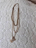 VINTAGE 3 STRAND METAL AND BEADED NECKLACE WITH UNIQUE CHARMS