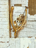 VINTAGE FLORAL WISHBONE BROOCH