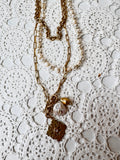 VINTAGE 3 STRAND METAL AND BEADED NECKLACE WITH UNIQUE CHARMS