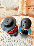 VINTAGE AMISH COUPLE SALT AND PEPPER SHAKERS