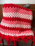 VINTAGE HANDMADE RED AND PINK TASSEL AFGHAN