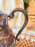ANTIQUE SILVER ORNATE PITCHER