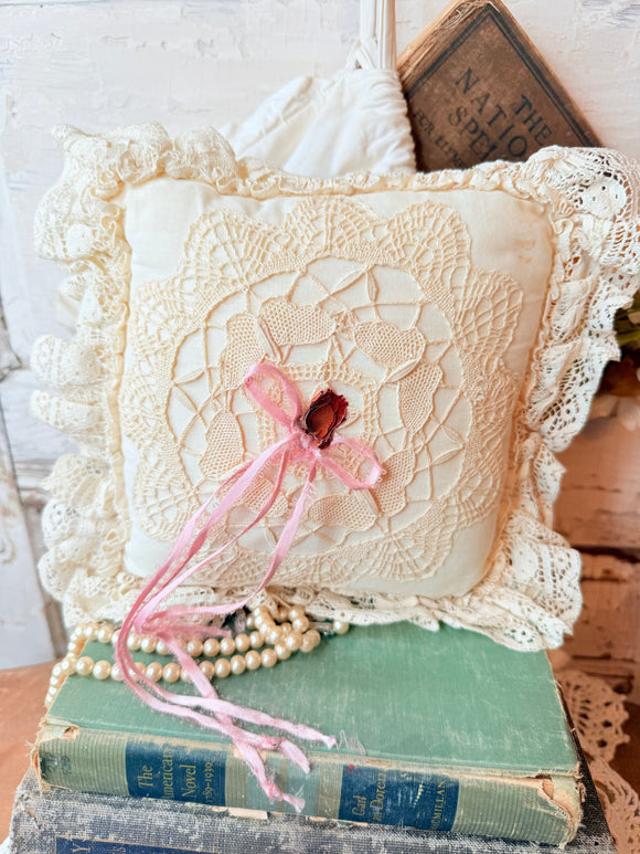 Beautiful handmade vintage lace pillow with bow ￼