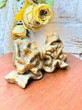 VINTAGE BRASS TONE BOW CANDLE HOLDER