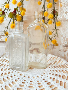 PAIR OF ANTIQUE GLASS BOTTLES