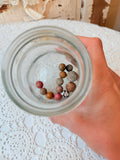 GLASS MASON JAR WITH ANTIQUE CLAY MARBLES