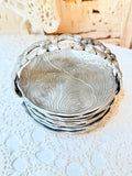 VINTAGE SET OF ALUMINUM DETAILED COASTERS AND HOLDER