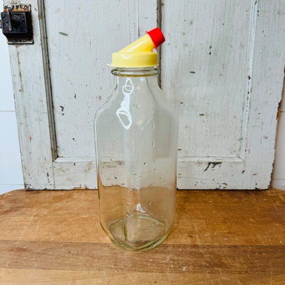 VINTAGE GLASS MILK BOTTLE WITH SPOUTED TOP