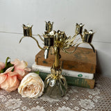 GOLDEN FLORAL CANDELABRA WITH GLASS BALL BASE