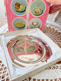 VINTAGE SET OF 4 SILVER PLATES IN ORIGINAL PACKAGING