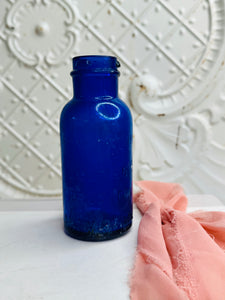 ANTIQUE COBALT BLUE STAMPED BOTTLE