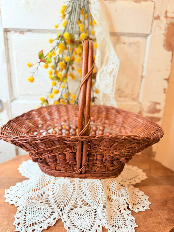 VINTAGE WICKER BASKET WITH BEADED ACCENT