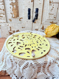 YELLOW VINTAGE FLORAL IRON TRIVET