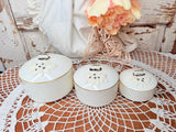 VINTAGE SET OF 3 FLORAL CELLULOID NESTING JARS