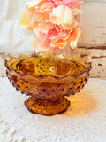 VINTAGE AMBER GLASS OR AGE HOBNAIL COMPOTE