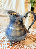ANTIQUE SILVER ORNATE PITCHER