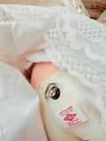 VINTAGE BABY DOLL IN CRADLE MUSICAL