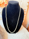 ANTIQUE LONG KNOTTED PEARL NECKLACE