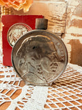 VINTAGE AVON BOTTLE SILVER COIN