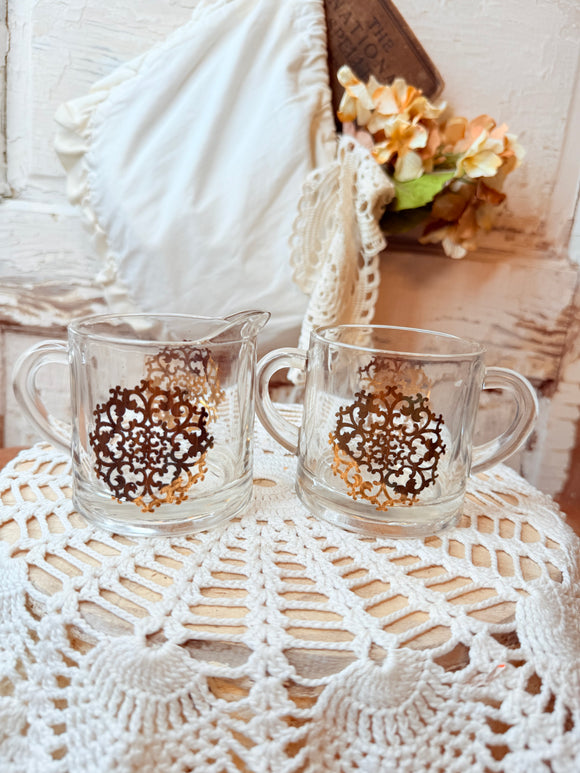 VINTAGE GLASS SUGAR AND CREAMER WITH GOLD OVERLAY