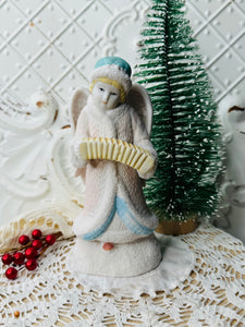 Vintage porcelain Christmas angel Carolee statue