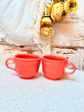 VINTAGE PAIR OF FIESTA WARE CORAL MUGS