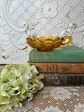 VINTAGE YELLOW GLASS DISH WITH HANDLE SUN AND STARS