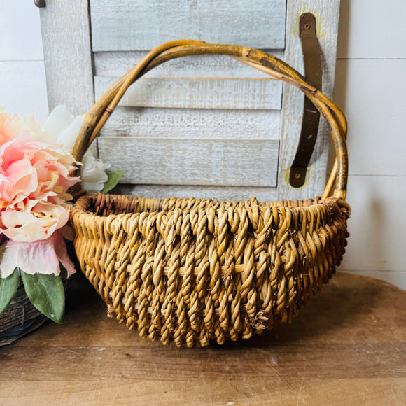 VINTAGE ORNATE WICKER WALL BASKET