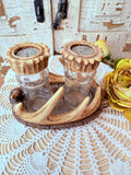 PAIR OF VINTAGE SALT AND PEPPER SHAKERS IN ANTLER HOLDER