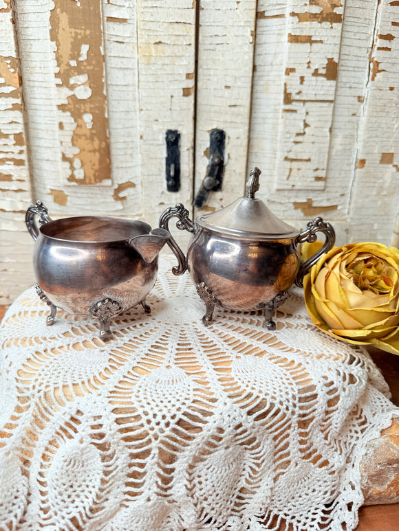 VINTAGE SILVER SET - ORNATE CREAMER AND SUGAR BOWL